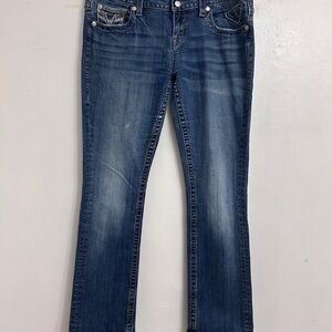 Vigoss size 14 medium wash denim jeans with embellished back pockets